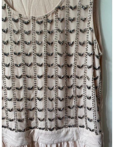 Vestito rosa con perline