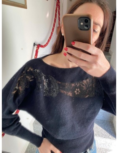 Maglione nero con applicazioni