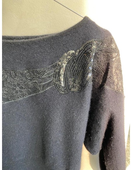 Maglione nero con applicazioni