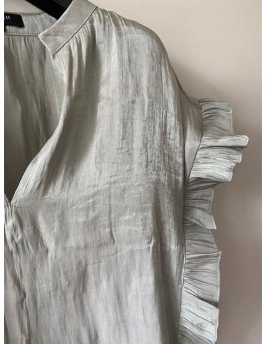 Canotta con balze laterali