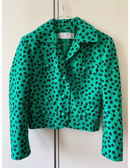 Completo verde con motivi neri