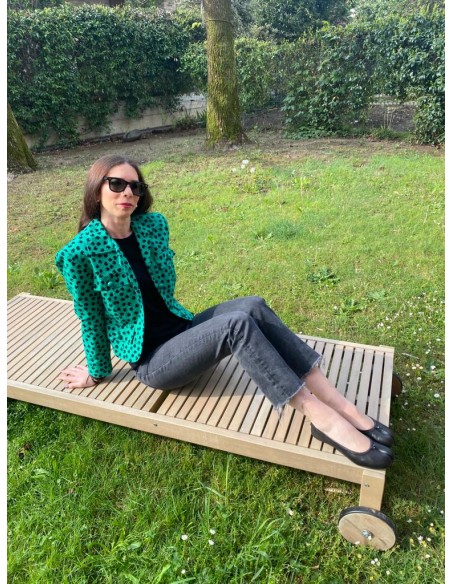 Completo verde con motivi neri